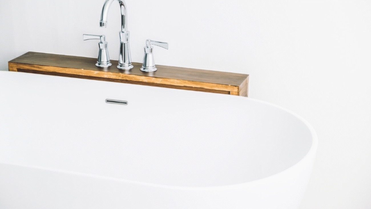 bathtub with deck mount faucet